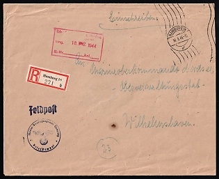 1944 (16 Mar) Third Reich, Germany, Registered Military Mail Field Post Feldpost, Stampless free tariff Cover from Naval Supply Office in Hamburg (Germany) to Naval High Command North Sea in Wilhelmshaven (Germany), with red registration label, violet round official letter cancellation 'Naval Food Service in Hamburg', roller cancellation, red rectangular office handstamp '18 Mar 1944', handstamped registration marking '23'